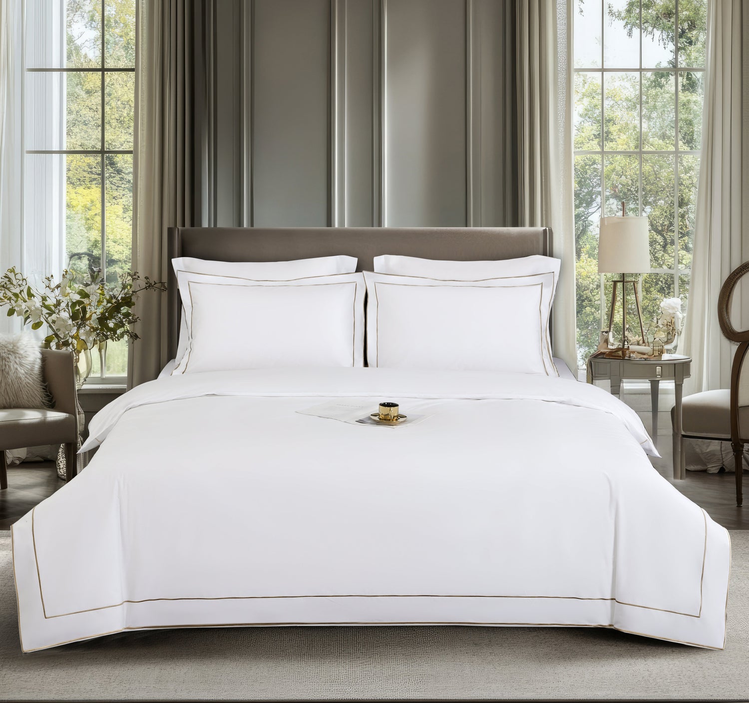 Neatly made bed with white bedding in a well-lit bedroom